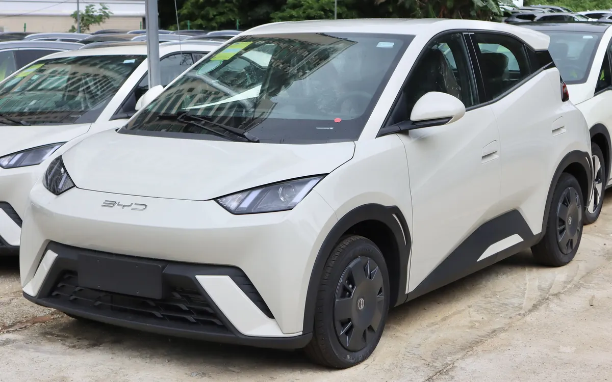 A white first-generation BYD Seagull small electric hatchback parked outdoors (illustrative photo of the outgoing model)