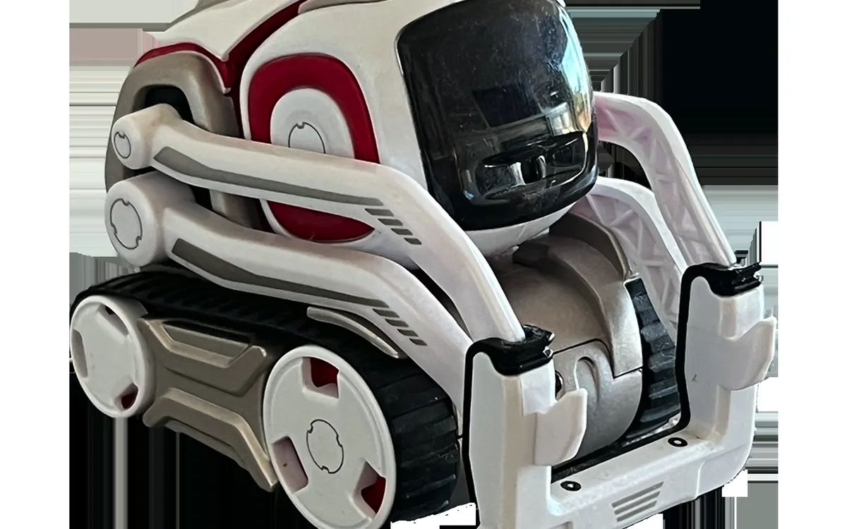 Small AI companion robot toy on a table (illustrative photo, not the Eiliko)