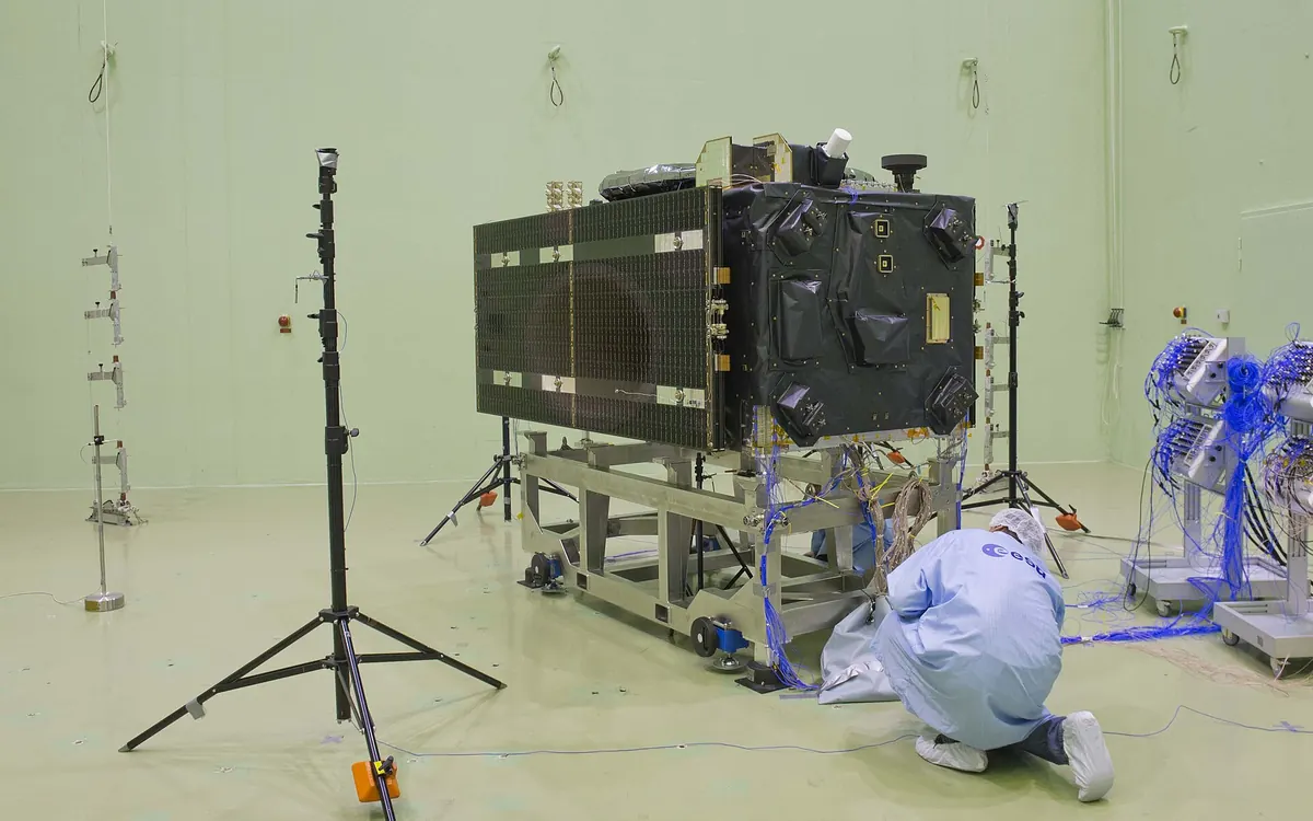 A Galileo navigation satellite inside ESA's acoustic test chamber