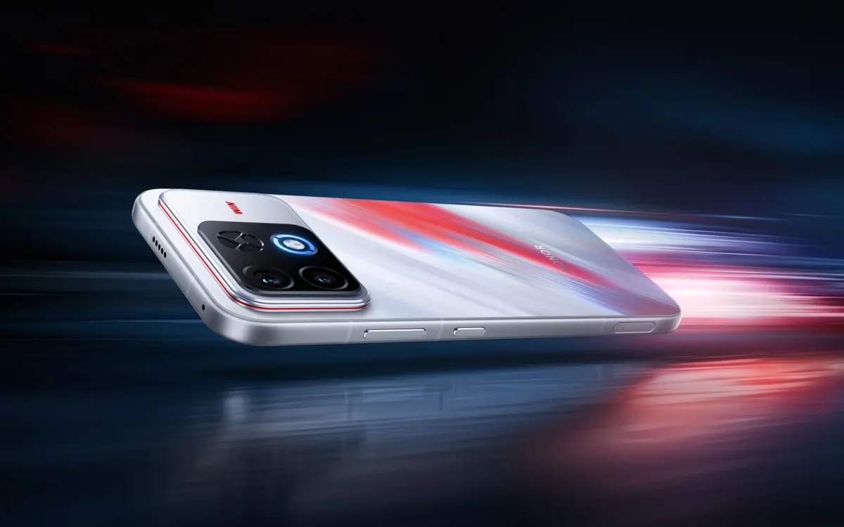Official render of the Honor WIN 2 gaming phone from the back, with a white finish streaked in red and blue and a large square camera module