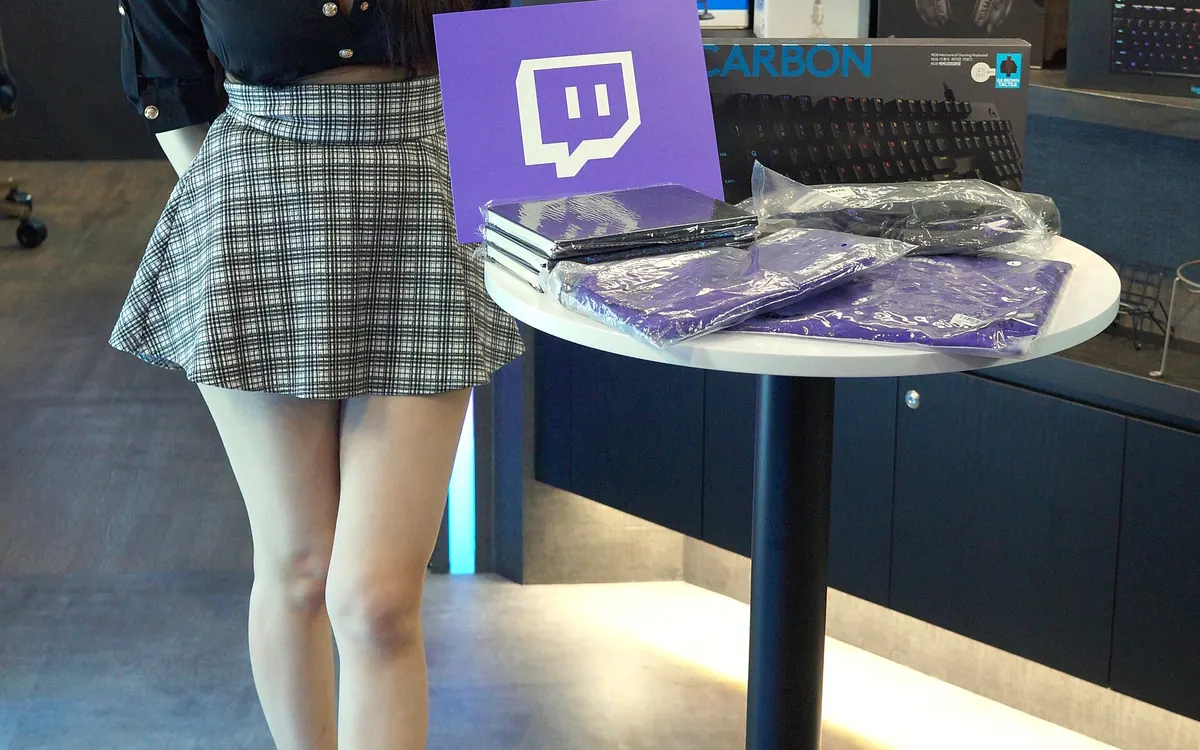 Gaming keyboard and merch on a desk (illustrative esports/PC gaming photo)