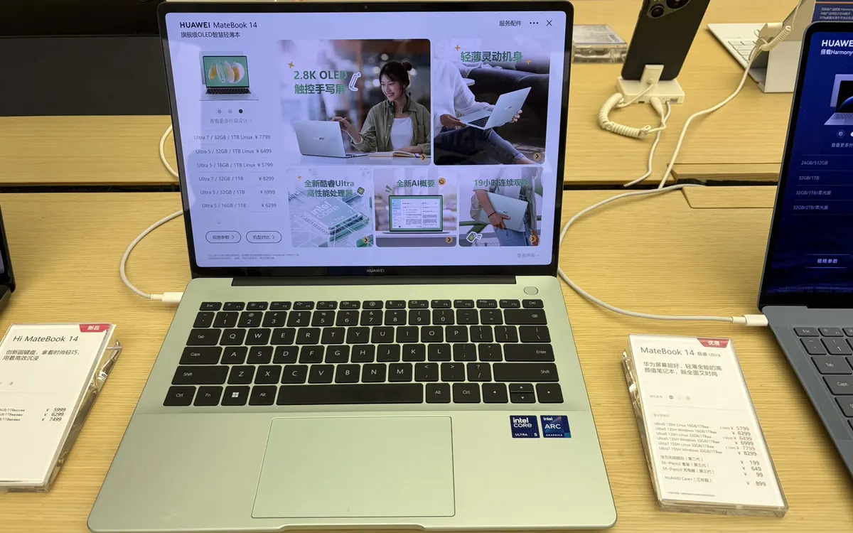 A Huawei MateBook 14 laptop with an OLED touchscreen on display in a shop (illustrative photo)