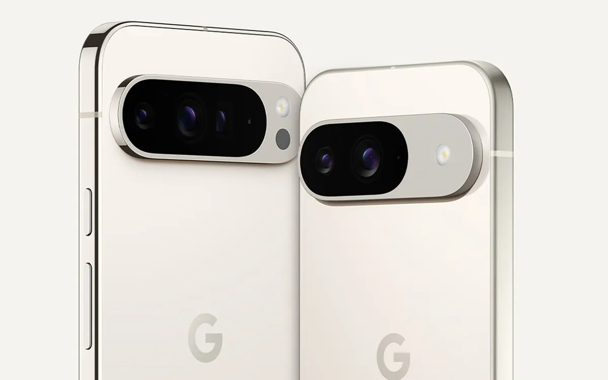 Google Pixel 9 Pro and Pixel 9 phones in a light Porcelain finish, seen from the back with their camera bars