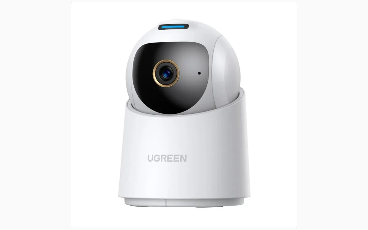 UGREEN SynCare Indoor Cam ID500 Pro, a white pan-and-tilt indoor camera with a round lens and UGREEN logo on its base