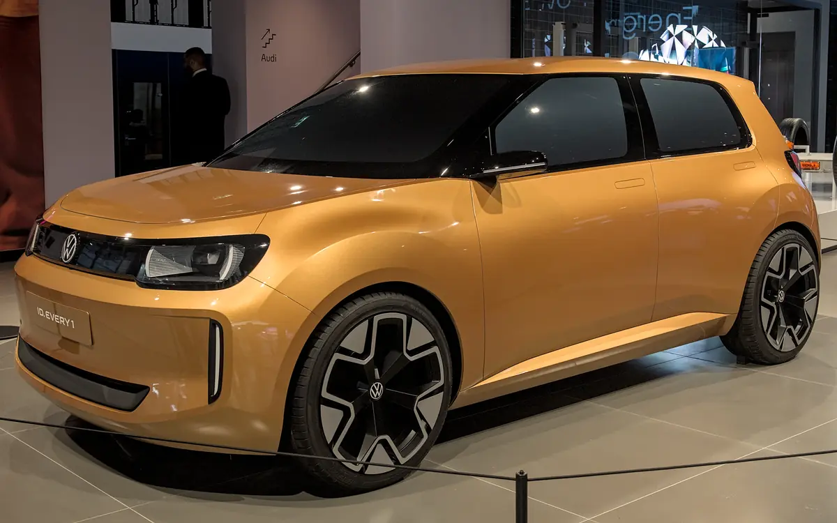 Orange Volkswagen ID. EVERY1 concept car on display at the IAA 2025 motor show