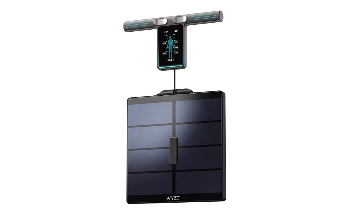 Black Wyze Scale Ultra BodyScan Plus: a glass scale with a cable-connected handle above it, a colour screen in the middle of the handle