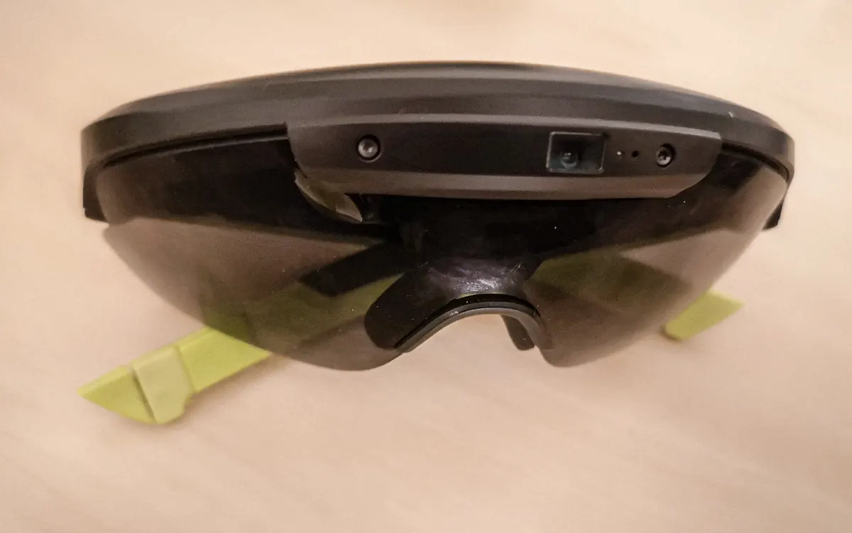 Consumer AR glasses on a table (illustrative photo of a different brand)